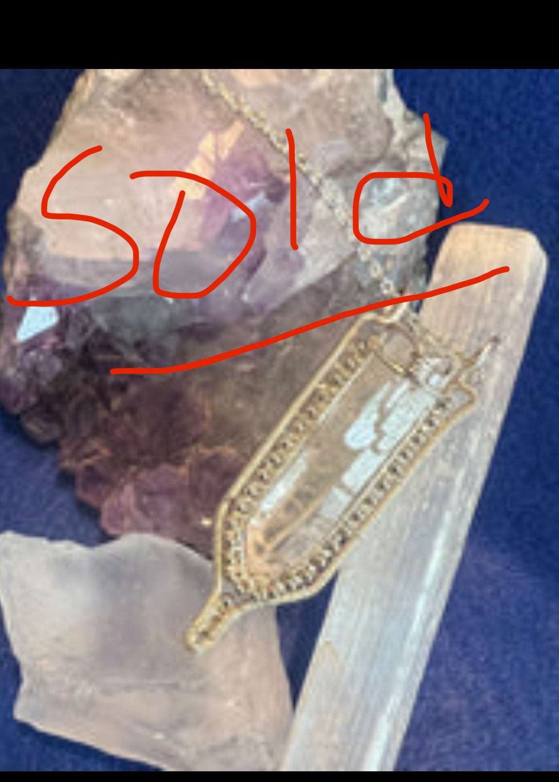 Wire wrapped crystal