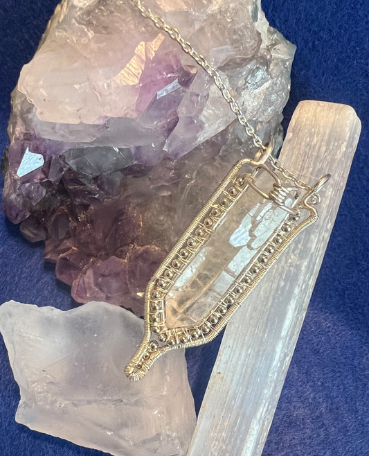 Wire wrapped crystal